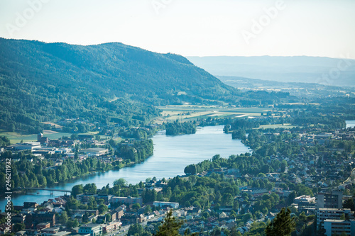 Panoramic top view of Drammen city, mountains in fog and valley with river, sunny weather. Norway © Suzi Media 