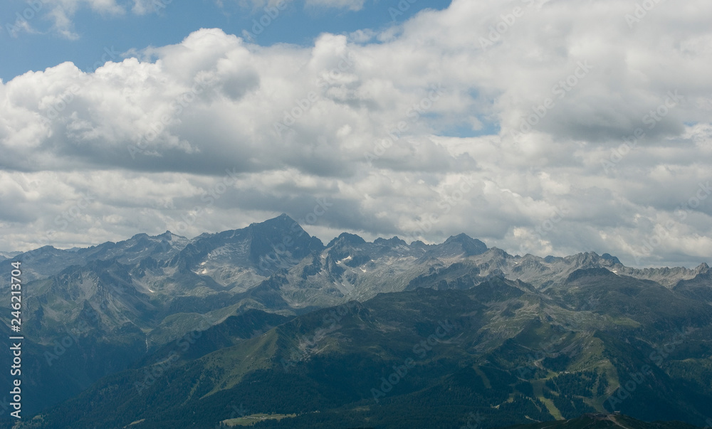 landscape of mountains of Brenta Dolomites, top of Serodoli and Zeledria peak, ski slopes of the Pradalago mountain, summer, sun, clouds, trekking, holidays, resorts, Unesco Heritage, Trentino, Italy