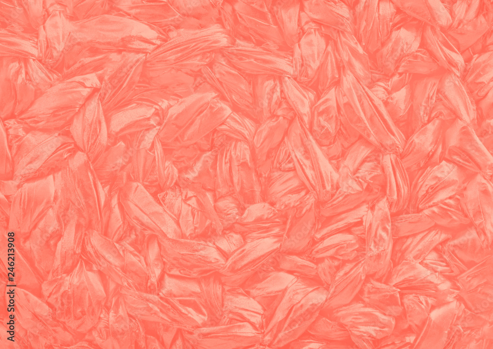 Fototapeta Tkana mata na tło w modnym żywym kolorze koralowym.