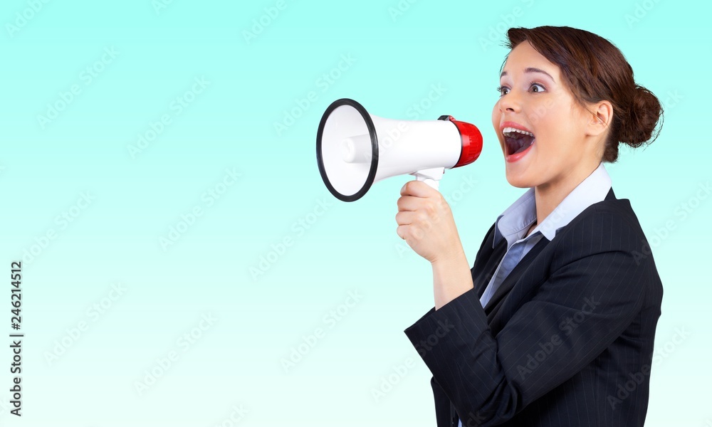 Portrait of woman holding megaphone, dressed in pin-up style Portrait of woman holding megaphone, dressed in pin-up style