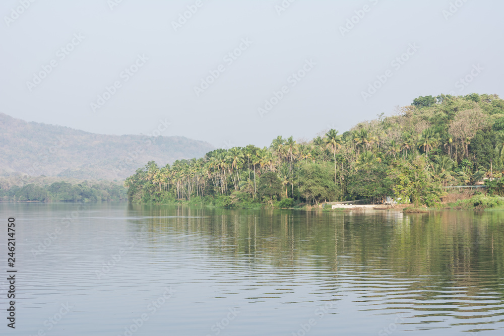 landscape of an island over a dam travel water river sky deforestation cutting trees landscape of an island over a dam travel water river sky deforestation cutting trees