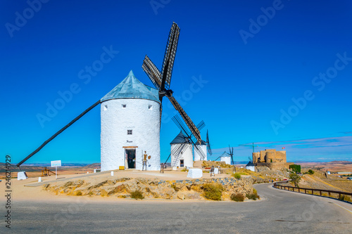 Castle at Consuegra surrounded with white windmills, Spain