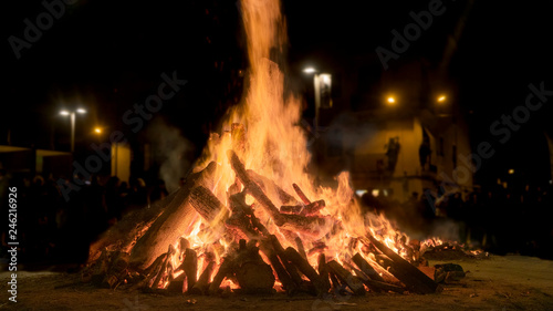 hoguera de san Juan, solsticio de verano. troncos ardiendo. 23 de junio photo