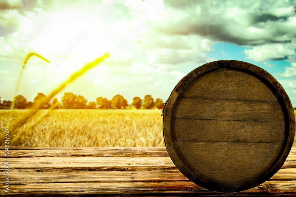 Old wooden barrel on a hot day in the cereal    