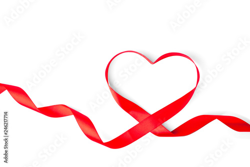 Heart shape of red ribbon isolated on white background. 