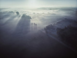 Top view aerial shot of foggy Polish village