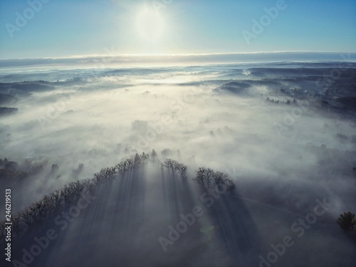 Top view aerial shot of foggy Polish village