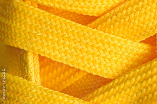 Yellow sneakers shoelaces photo