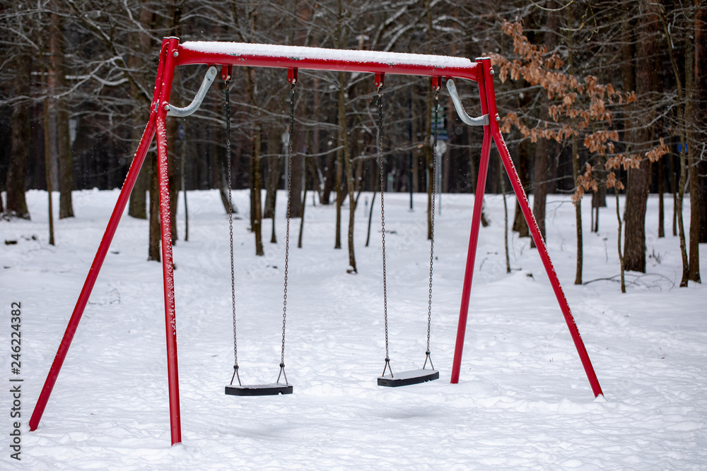 Empty chain swing in playground Empty chain swing in playground