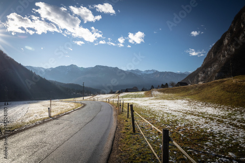 scenic mountain valley road in julian alps in winter, slovenia