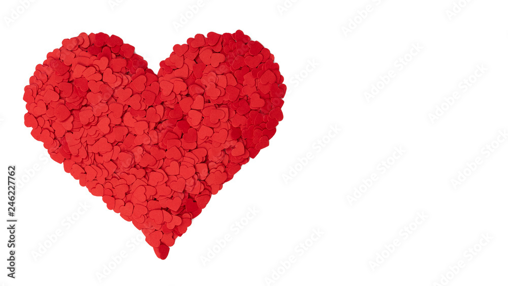 Big red heart made of confetti. Isolated on white with copy space.