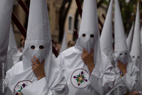 Photography The costumes of men and women hooded in Catholic processions