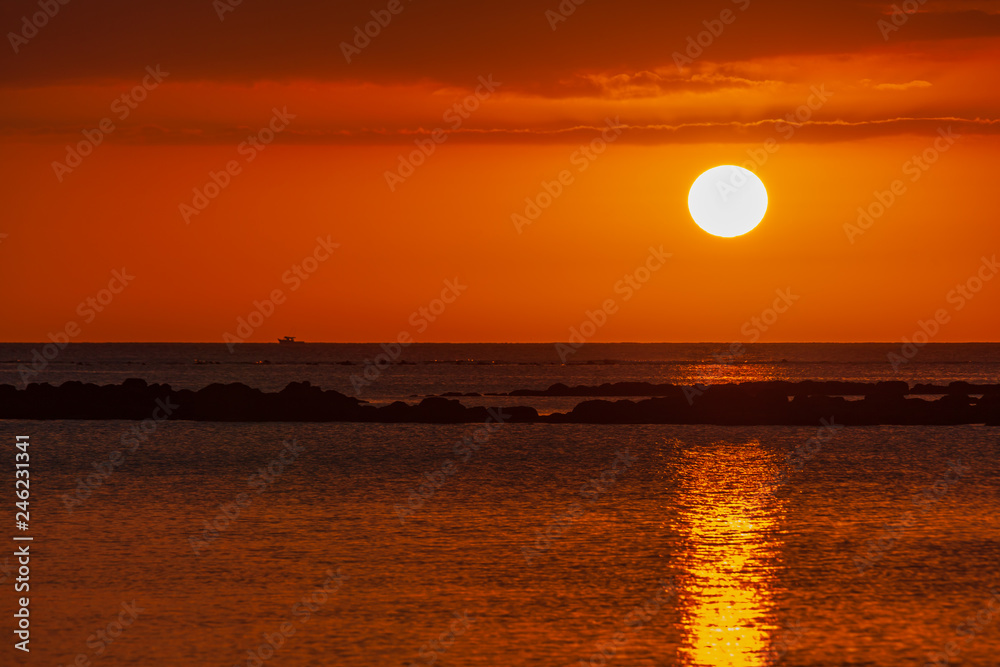 Colorful sunset over the sea near Mauritius island
