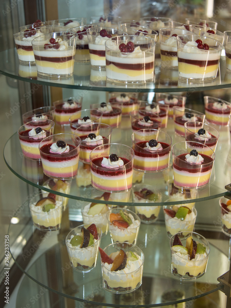 Single Portions of Mousse Packaged inside a Pastry Display Stand