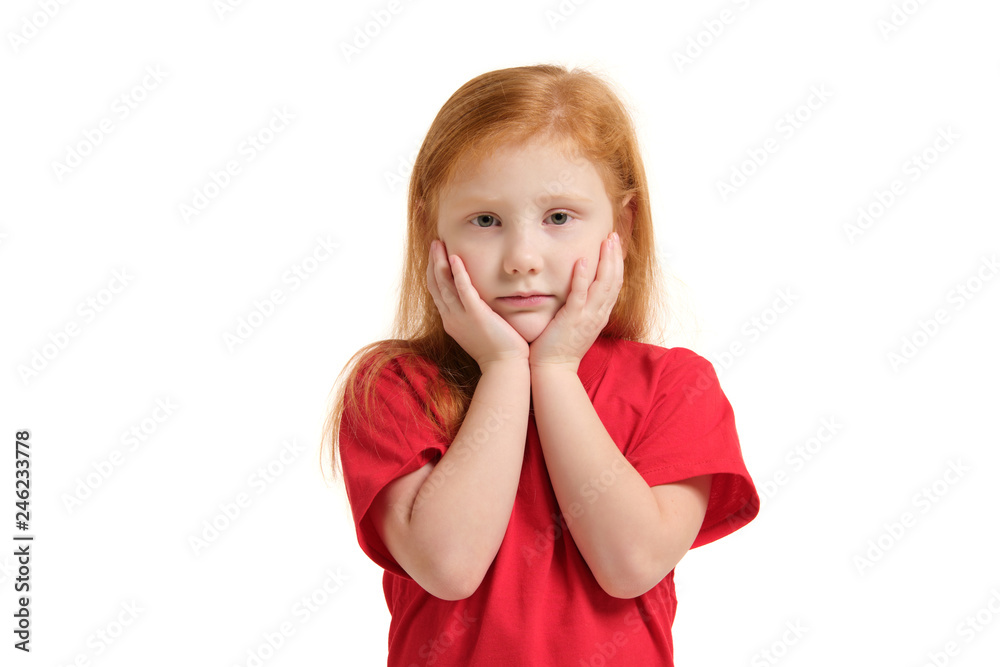 Portrait of sad grey-eyed little girl with hands near her face isolated on white background Portrait of sad grey-eyed little girl with hands near her face isolated on white background