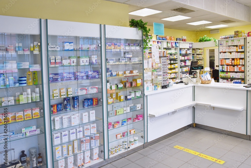 May 2, 2016 Brno Czech Republic. Interior of a pharmacy with goods and showcases. Medicines and vitamins for health. Shop concept, medicine and healthy lifestyle.