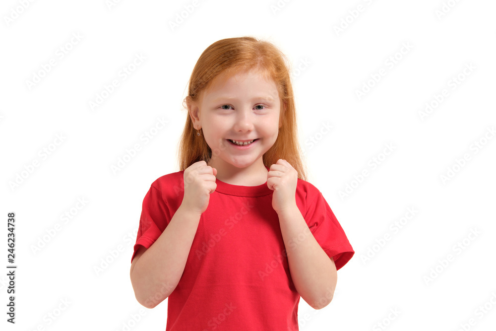 Cheerful little girl, look so excited she is raising her fists up, isolated on white background. Cheerful little girl, look so excited she is raising her fists up, isolated on white background.
