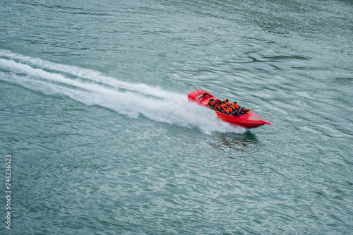 High speed red boat floats on the Danube