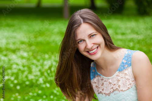 Portrait of beautiful young happy woman