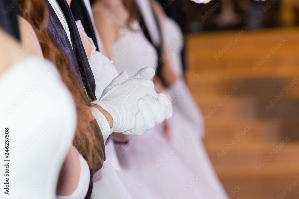 Wedding theme, holding hands newlyweds White gloves