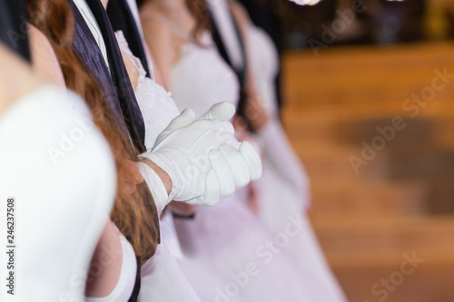 Wedding theme, holding hands newlyweds White gloves