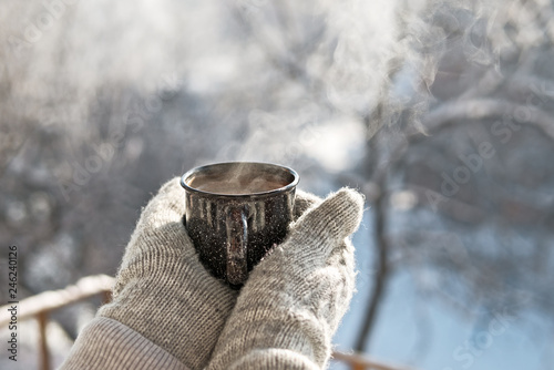 Woman hands holding hot cup coffee, tea