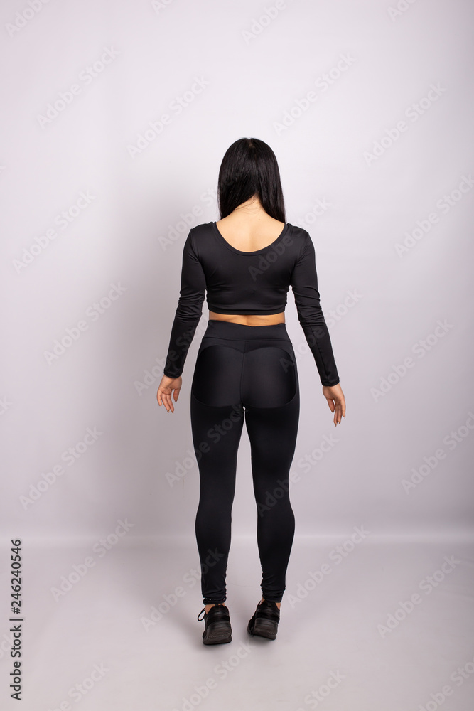Rear view of sexual sporty woman wearing leggings Rear view of sexual sporty woman wearing leggings
