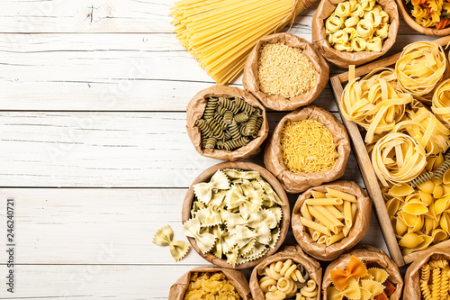 Assortment of pasta on a wooden table