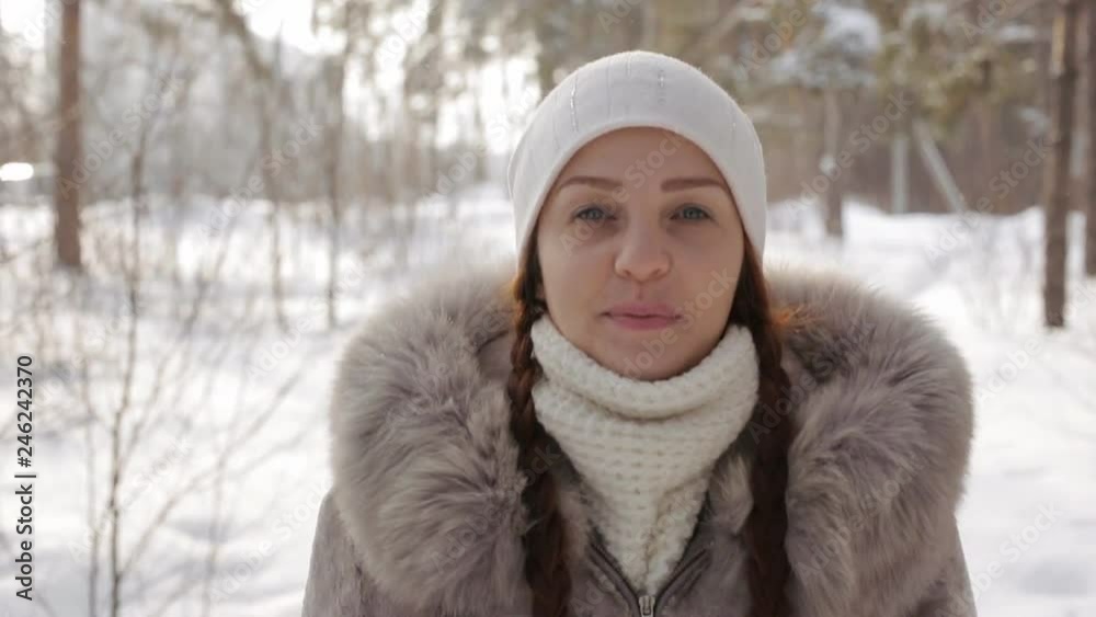 portrait of a beautiful woman in the winter forest portrait of a beautiful woman in the winter forest