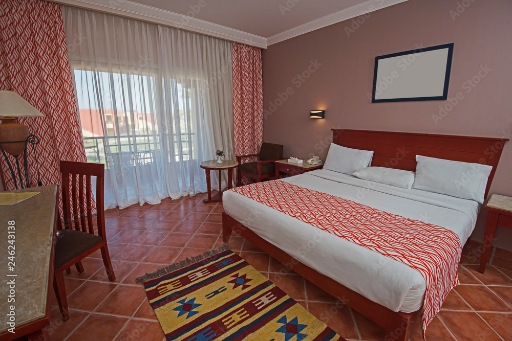 Double bed in a luxury suite of a hotel room Stock Photo | Adobe Stock