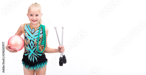Teenager girl holding rhythmic gymnastics accessories board with blank space for text