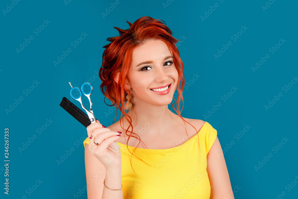 Happy woman holding showing scissors and comb. Happy woman holding showing scissors and comb.