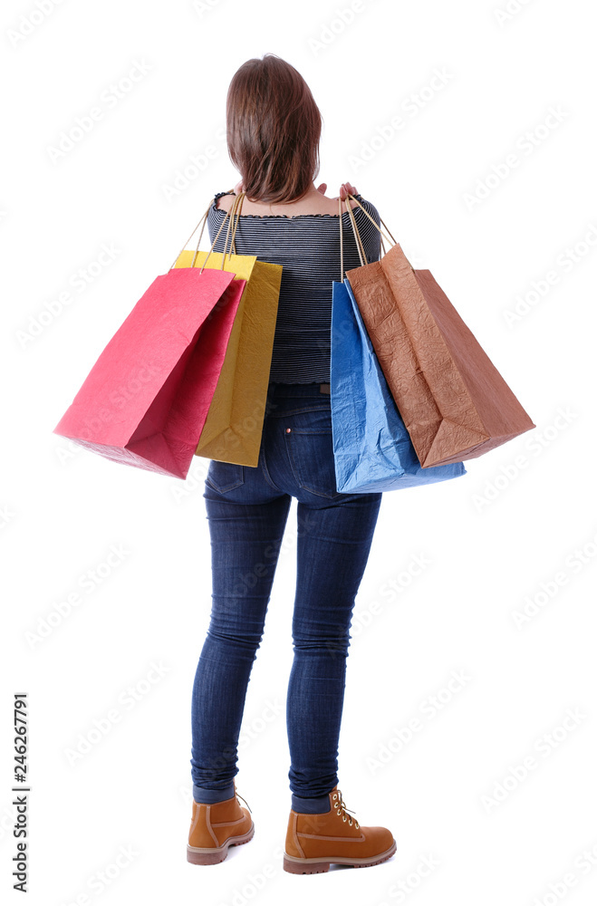 back view of woman with shopping bags