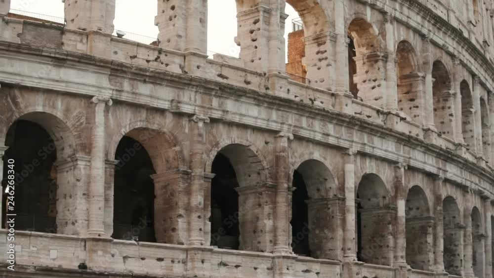 Close-up of most popular monument in Italy. Terrific shot of Colosseum in morning. Rome. Sightseeing. Travel destination. Daytime. Close-up of most popular monument in Italy. Terrific shot of Colosseum in morning. Rome. Sightseeing. Travel destination. Daytime.