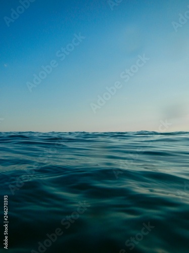   Save Download Preview horizon meets water  ocean rippled water meets sky  seascape of calm water clear sky  cloudless blue sky