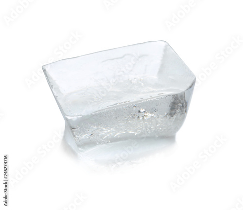 Transparent ice cube melting on white background