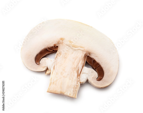 Slice of fresh champignon mushroom on white background, closeup