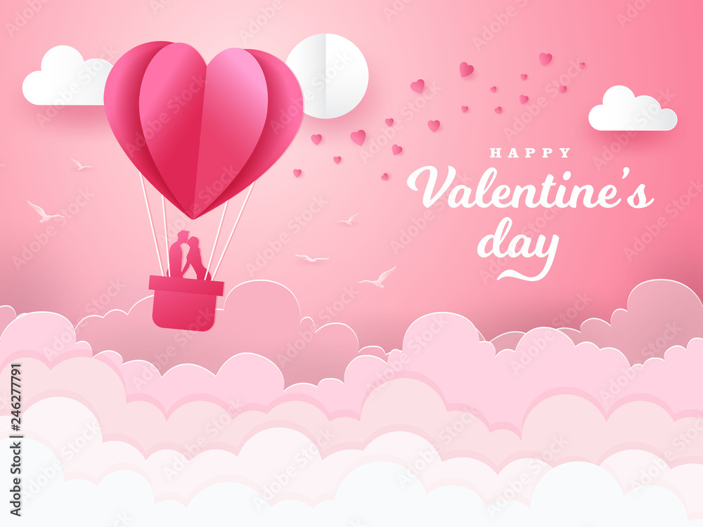 Valentine's Day background with romantic couple kissing and standing inside a basket of an air balloon. paper cut style vector illustration
