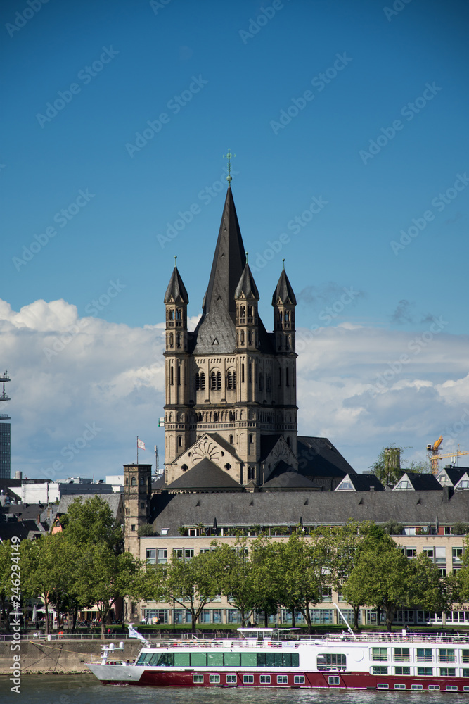 Great St. Martin Church and colorful houses  in Cologne, Germany,2017