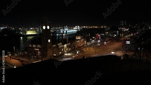 time lapse from hamburg landungsbr√ºcken. you see traffic passing by, the hamburg harbor photo