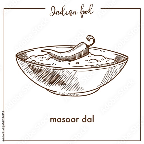 Masoor dal with chili pepper in deep bowl from Indian food.