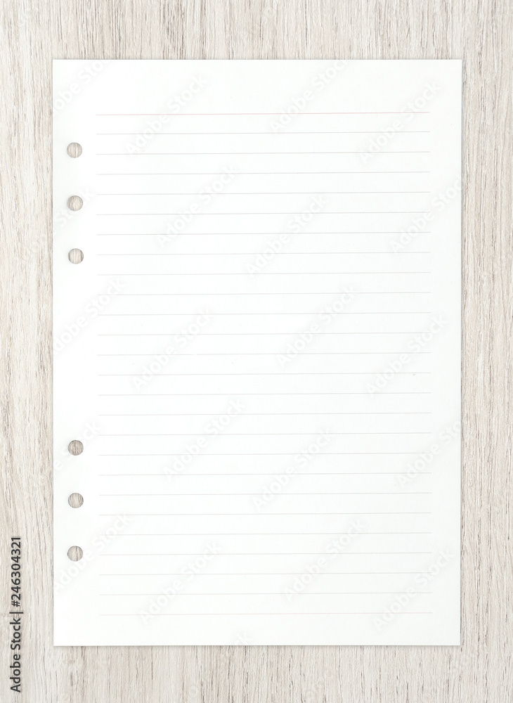 White paper sheet on wood for ackground. White paper sheet on wood for ackground.