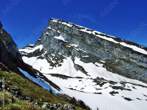 Alpine peak Brisi in the Churfirsten mountain range, between the Toggenburg region and Lake Walensee - Canton of St. Gallen, Switzerland photo