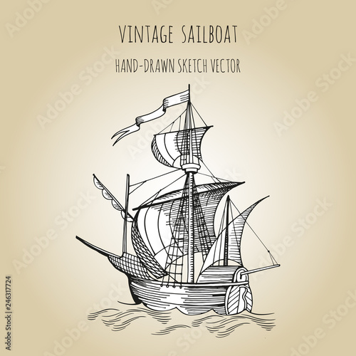 Old caravel, vintage sailboat. Hand drawn sketch. Detail of the old geographical or fanasy maps of sea. photo