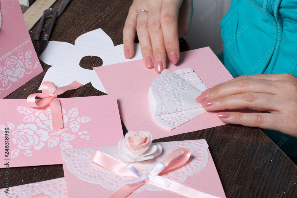 Making greeting cards from paper, cardboard and tape. Woman artisan at work. Making greeting cards from paper, cardboard and tape. Woman artisan at work.