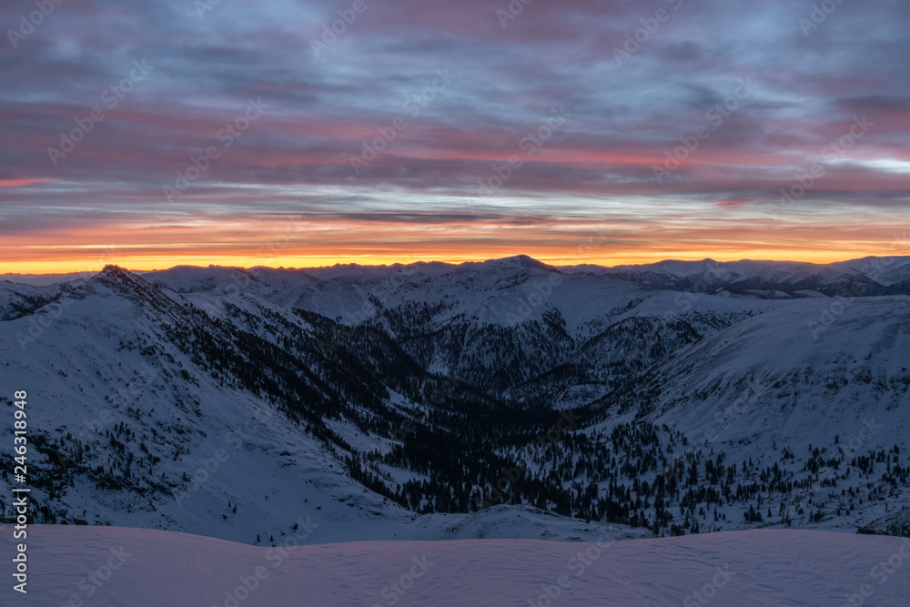 Colorful sky at sunrise in Khamar-Daban mountains