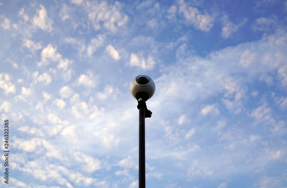 360 cam outdoor against blue sky and white clouds 360 cam outdoor against blue sky and white clouds