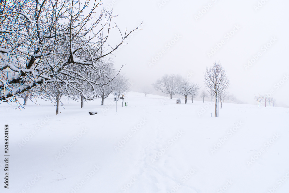 Winter Switzerland fairytale chapel on hill Winter Switzerland fairytale chapel on hill