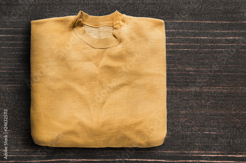 Sweatshirt on wooden background