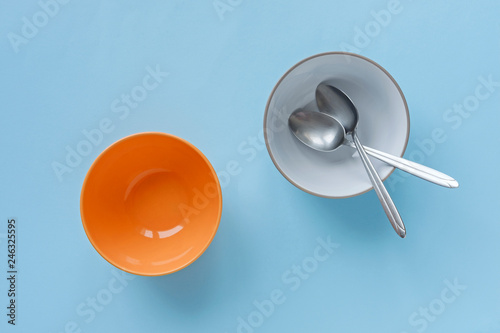 Empty blue and orange breakfast or dessert bowls